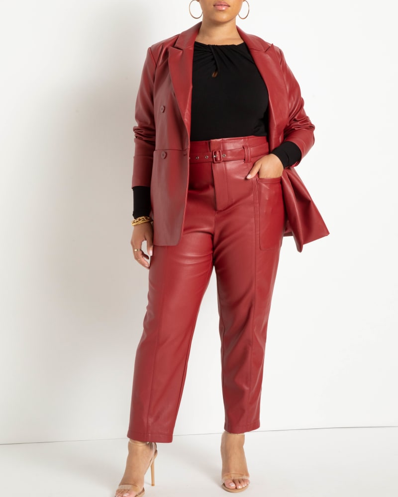 Front of a model wearing a size 14 Brooke Faux Leather Pant in Biking Red by ELOQUII. | dia_product_style_image_id:231503